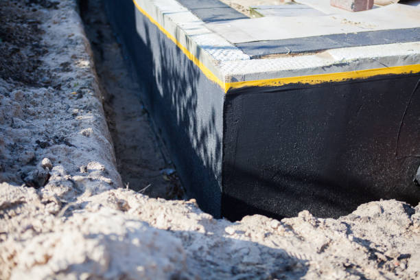 Professional Waterproofing technician working in Cordova, AL